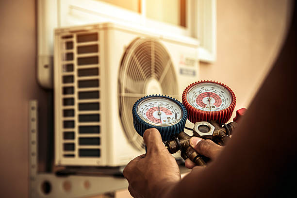 Professional Air Conditioning Service technician working in Islip Terrace, NY